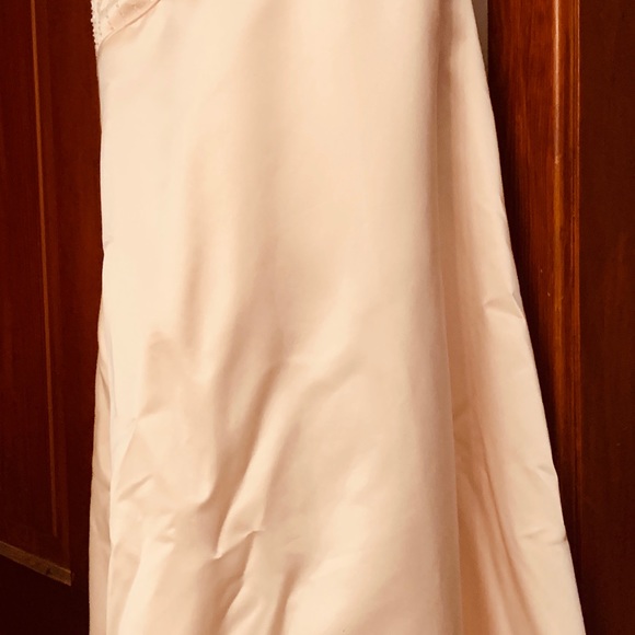 Beautifully hand beaded wedding gown.